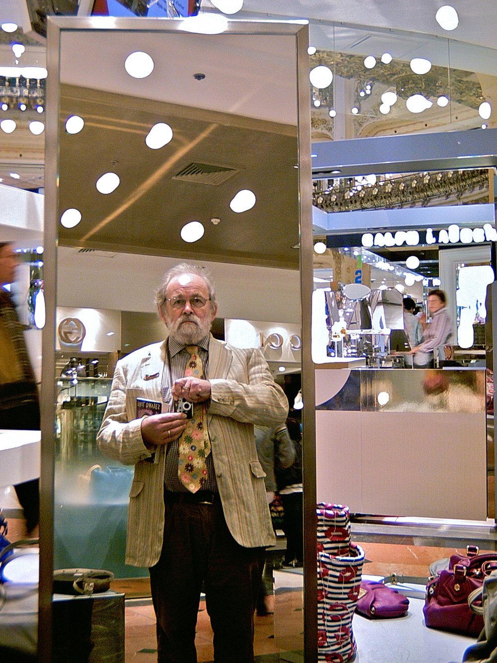   Above image and the two below: Minox indoors at Galeries Lafayette department store, Paris; automatic 1/10th second shutter speed, f2.8, manual (guessed) focus, ISO 100.  